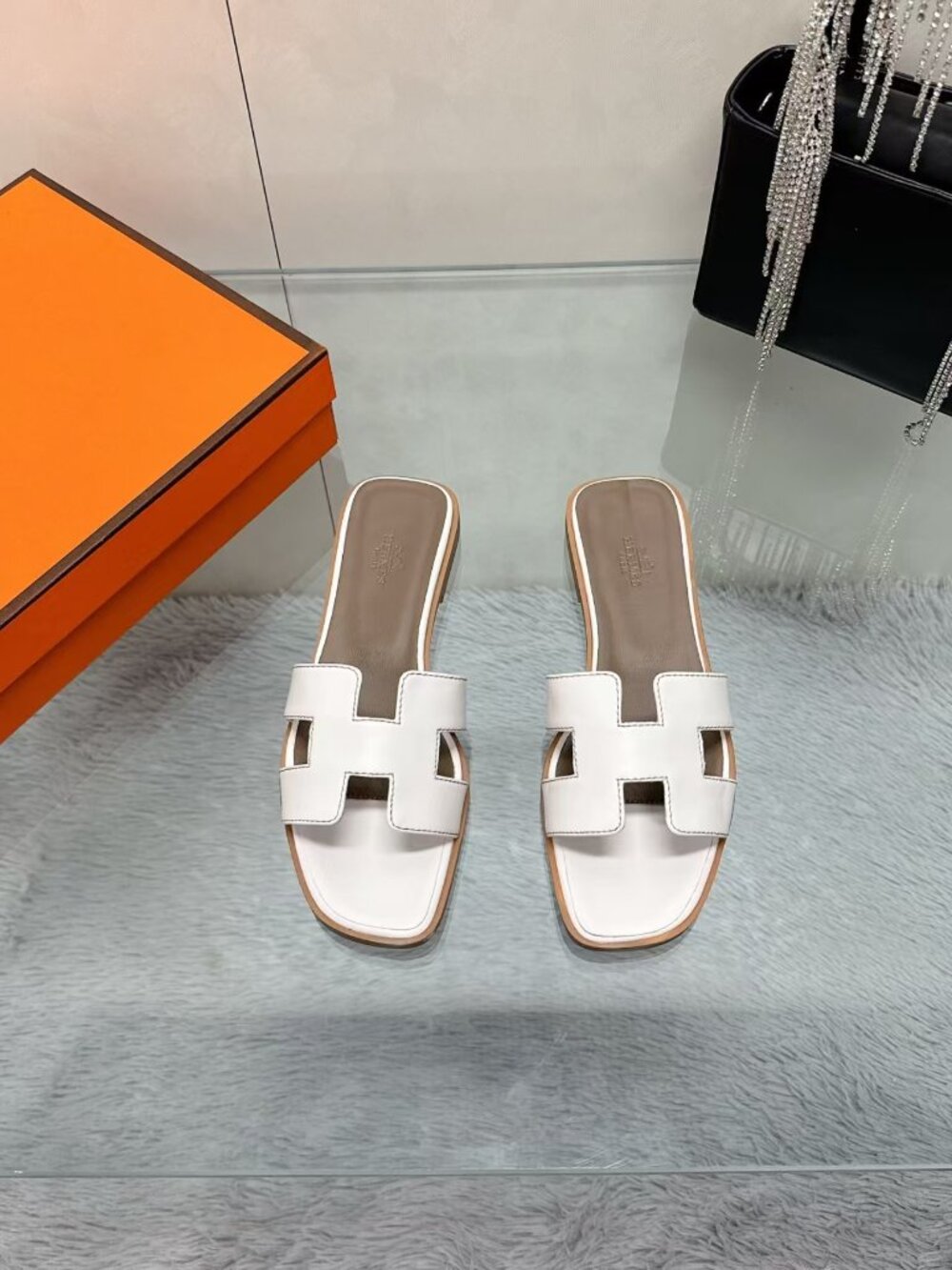 Hermès Oran White Leather H Cutout Flat Slide Sandals